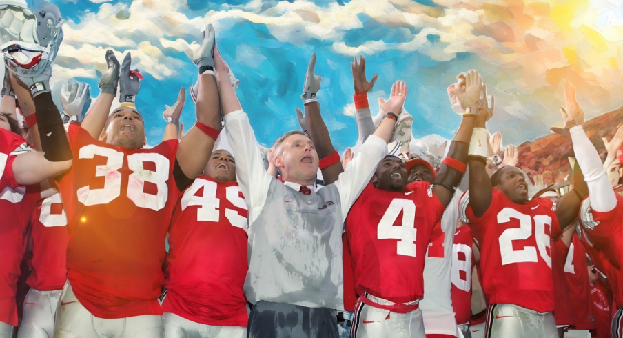 Nov 20, 2004; Columbus, OH, USA; Ohio State Buckeyes head coach Jim Tressel signs Carmen Ohio after a victory against the Michigan Wolverines at Ohio Stadium. The Buckeyes beat the Wolverines 37-21. Mandatory Credit: Matthew Emmons-USA TODAY Sports