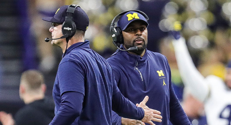 Jim Harbaugh and Sherrone Moore