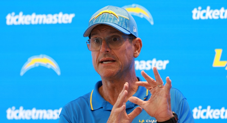 Jul 24, 2024; El Segundo, CA, USA; Los Angeles Chargers head coach Jim Harbaugh speaks to the media after the first day of training camp at The Bolt. Mandatory Credit: Kiyoshi Mio-USA TODAY Sports