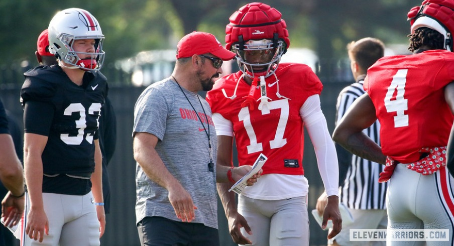 Carnell Tate talking with Ryan Day