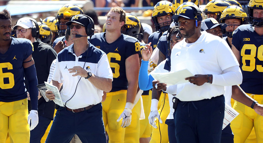 Jim Harbaugh and Sherrone Moore