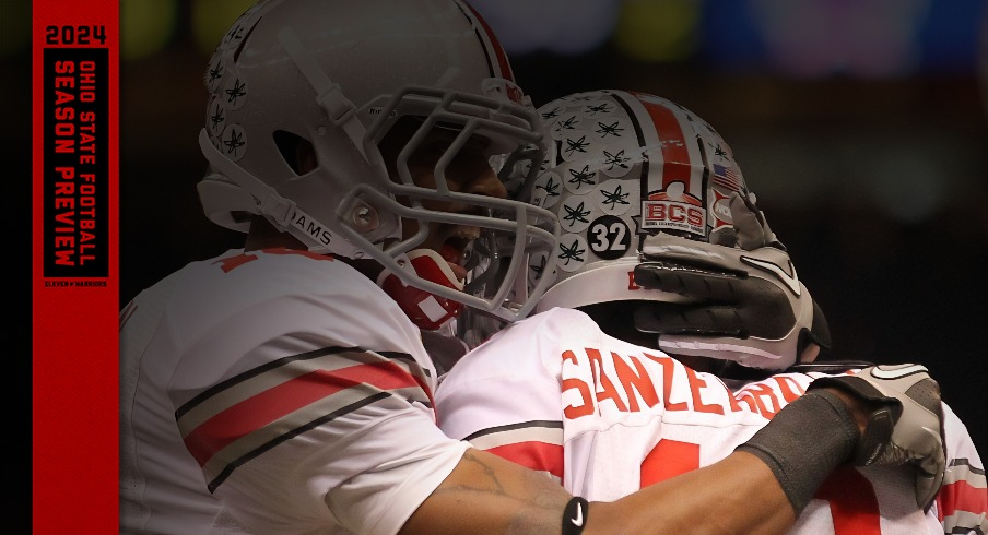 Jan 4, 2011; New Orleans, LA, USA; Ohio State Buckeye receiver Dane Sanzenbacher (12) celebrates his second quarter touchdown with receiver Corey Brown (10) against the Arkansas Razorbacks during the 2011 Sugar Bowl at the Louisiana Superdome . Mandatory Credit: Matthew Emmons-USA TODAY Sports