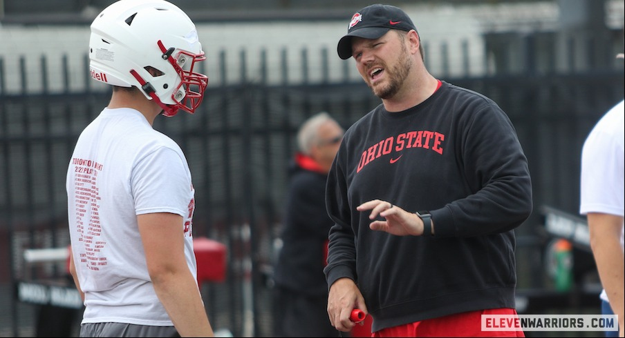 Justin Frye talking to a recruit