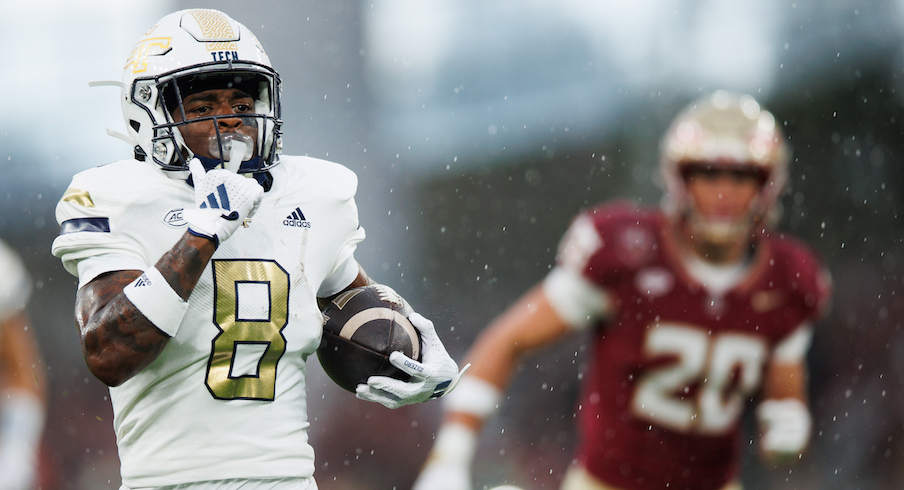 Malik Rutherford running away from the Florida State defense