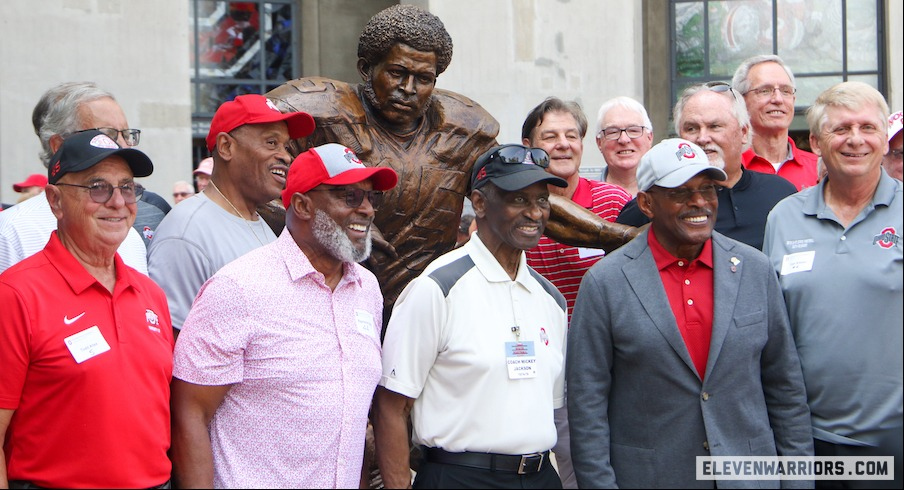 Archie Griffin and his former Ohio State teammates with his new statue