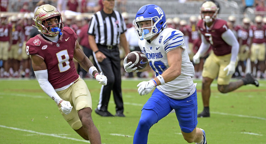 Memphis wide receiver Koby Drake runs away from Florida State cornerback Azareye’h Thomas