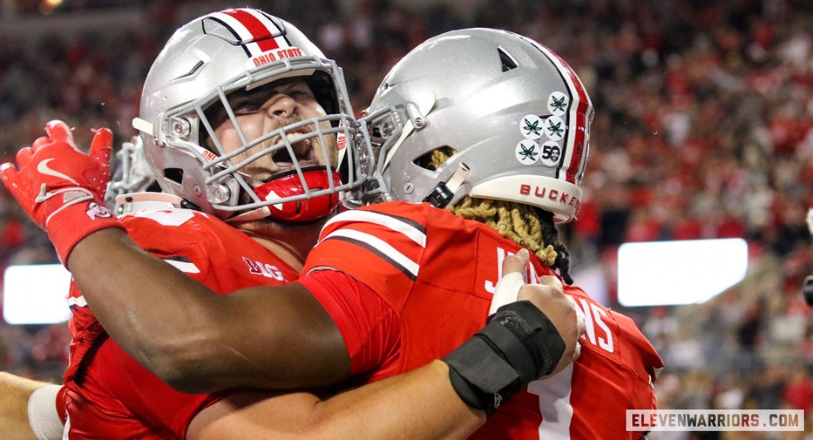 Ohio State center Seth McLaughlin (left) and running back Quinshon Judkins (right)