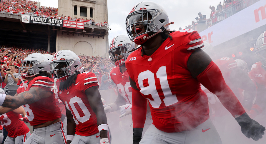 Tyleik Williams running out the tunnel before the Akron game