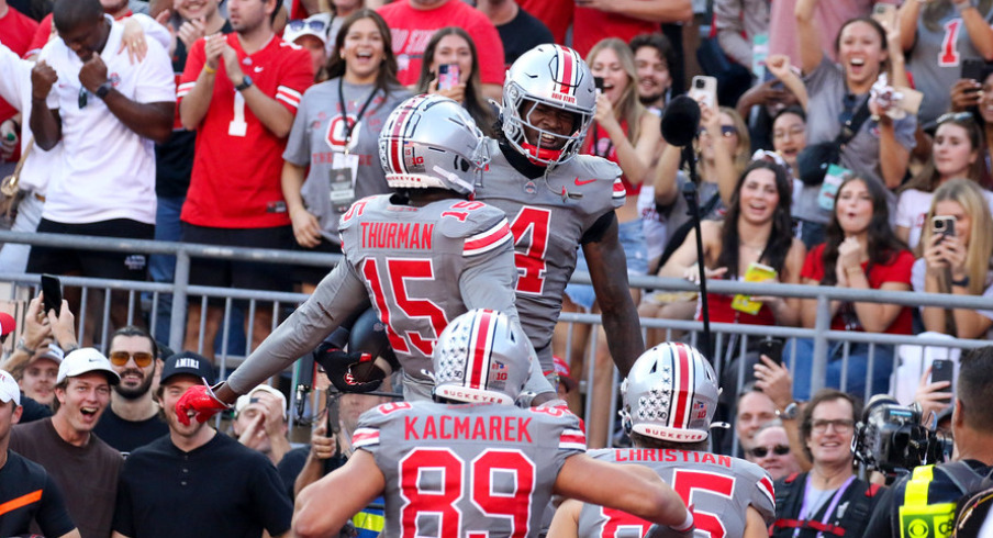 Ohio State players celebrate a touchdown against Iowa