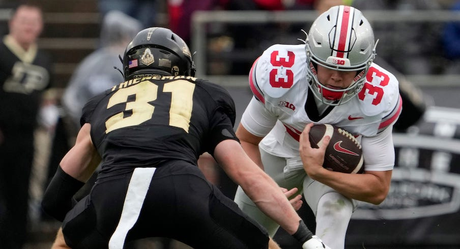 Dillon Thieneman tackling Devin Brown in Ohio State’s 2023 win over Purdue