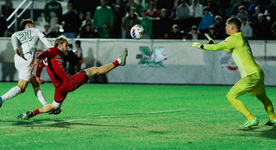 Marshall goalie Aleksa Janjic stops an Ohio State shot on goal