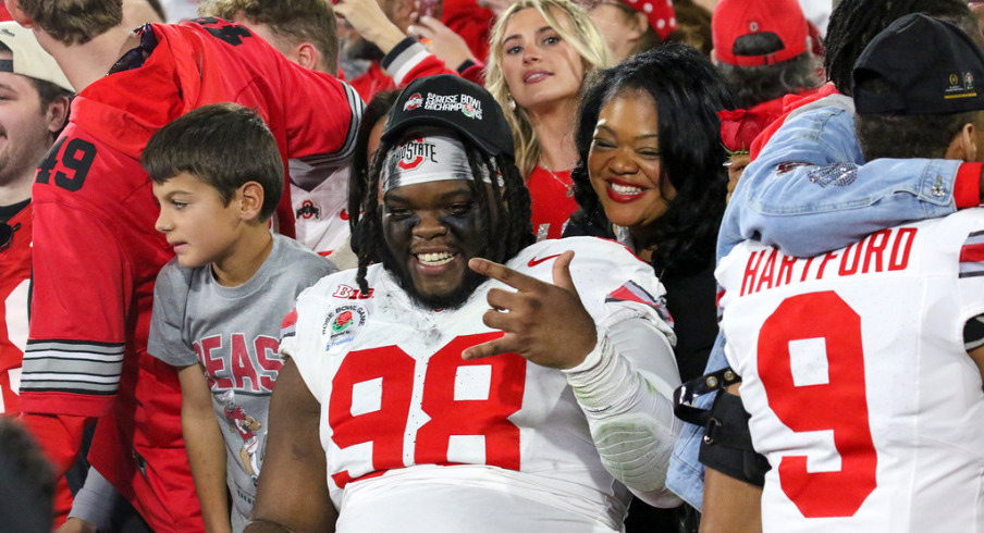 Ohio State players celebrate their Rose Bowl victory over Oregon