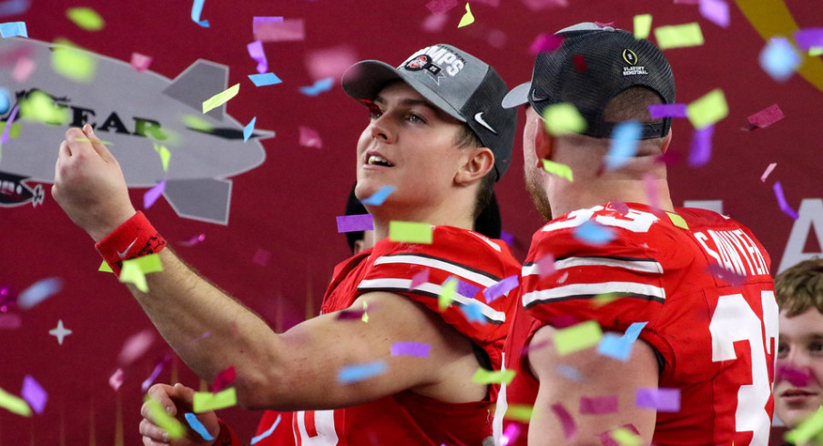 Ohio State players Will Howard and Jack Sawyer celebrate their win over Texas