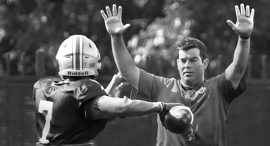 Ohio State Buckeyes acting head coach Ryan Day watches Ohio State Buckeyes quarterback Dwayne Haskins (7) throw during a drill at practice at Woody Hayes Athletic Center in Columbus, Ohio on August 7, 2018. [Kyle Robertson/Dispatch] 1013210418 Ohcol Ryan Day