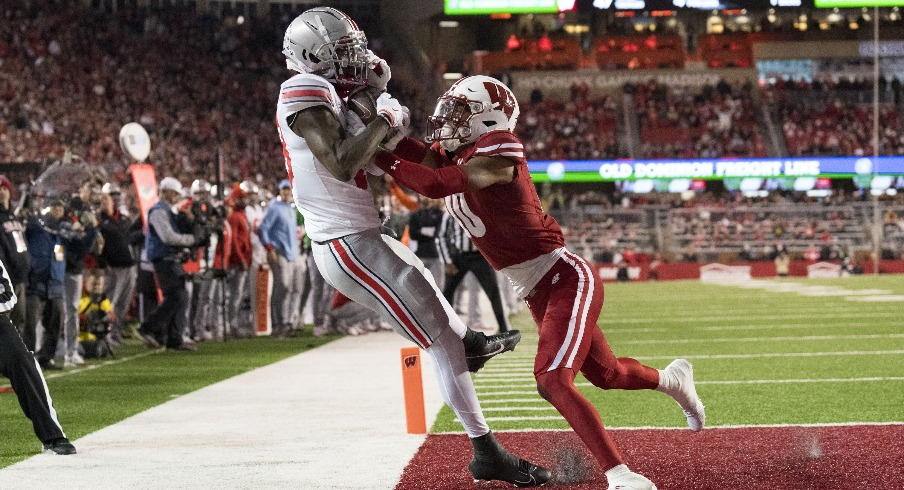 Former Ohio State wide receiver Marvin Harrison Jr. (left) and Wisconsin cornerback Nyzier Fourqurean