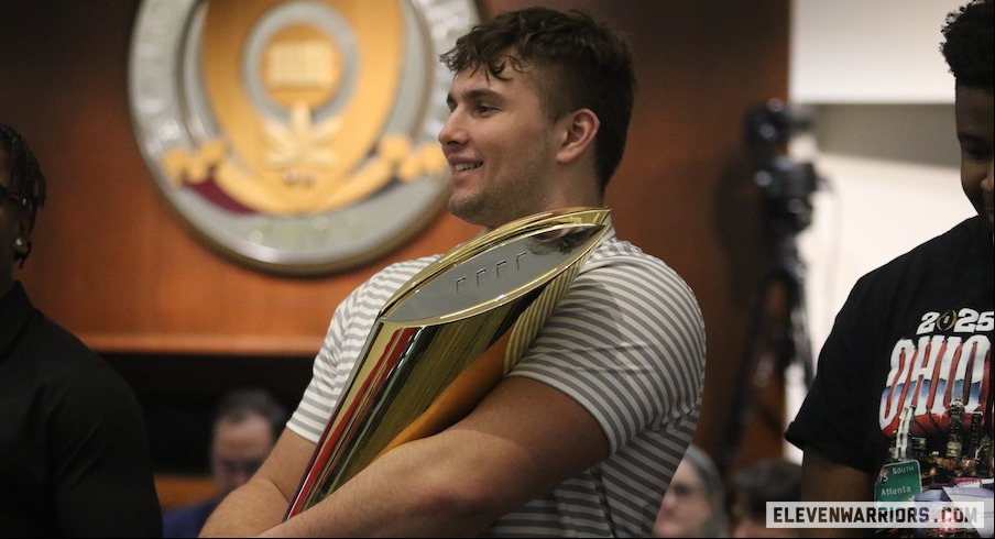 Carson Hinzman with the national championship trophy